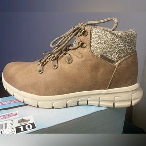 Sketchers brand new warm tech memory foam ankle boots.Tan colour like dark beige